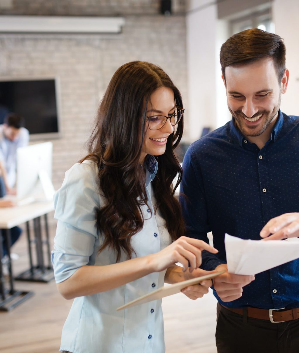 Corporate teamworking colleagues in modern office